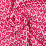 Coton matelassé double face fleurs fuchsia et vert au mètre