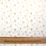 Popeline de coton imprimée étincelle doré fond blanc