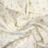 Popeline de coton imprimée étincelle doré fond blanc