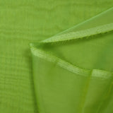 Mousseline 100% soie unie vert pomme changeant anis