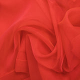 Mousseline de 100% soie unie rouge corail