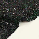 Maille bisous irisée vert fond noir