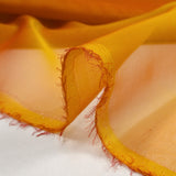 Mousseline 100% soie unie safran changeant rouge