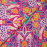 Coton imprimé amour de girafes fond fuchsia