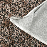 Microfibre imprimée polyester graou léopard fond sable et taupe