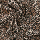Microfibre imprimée polyester graou léopard fond sable et taupe