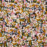 Viscosa estampada con flores de Ornella mostaza, rosa y celeste.