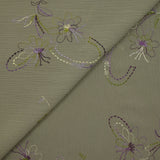 Crinkle muslin embroidered flowers sage background