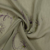 Crinkle muslin embroidered flowers sage background
