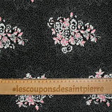 Maille de viscose satinée imprimé pois et fleurs fond noir