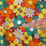 Algodón con estampado de flores disco en rojo, naranja y turquesa