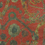 Maille polyester lamée bijoux et chaînes fond rouge