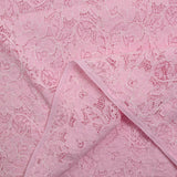 Dentelle fleurs des champs fond rose