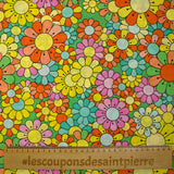 Coton imprimé flower power rose fond vert