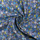 Coton imprimé prairie en fleurs bleu fond indigo