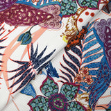 Jungle print quilted jersey with parrot on white background