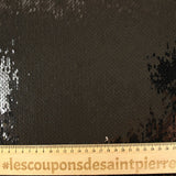Sequins noirs sur tulle stretch