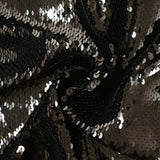 Sequins noirs sur tulle stretch