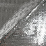 Silver sequins on gray tulle