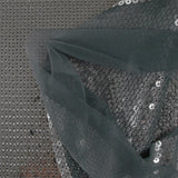 Silver sequins on gray tulle