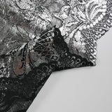 Dentelle festonnée impression argentée fond noir