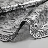 Dentelle festonnée impression argentée fond noir