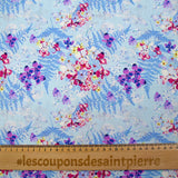 Popeline de coton imprimée l'ombre des fougères fond bleu layette