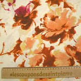 Viscose imprimée encre de fleurs orange et jaune fond écru