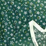 Popeline de coton imprimée étoile filante fond vert