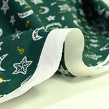 Popeline de coton imprimée étoile filante fond vert