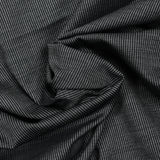 Tissu tailleur lin et laine mélangée pointillé blanc et gris fond noir