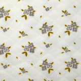 Jersey de coton matelassé imprimé fleurettes gris fond blanc