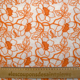 Lin viscose brodé ajouré fleurs orange fond blanc