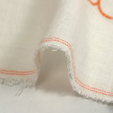 Lin viscose brodé ajouré fleurs orange fond blanc
