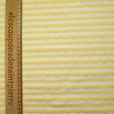 Jersey de coton rayure en texture jaune beurre et blanc