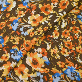 Crinkle Mousseline Satin Table of yellow and blue flowers brown background