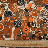 Viscose jersey printed field of orange and brown flowers on beige background