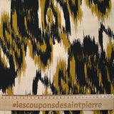 Printed viscose mystical leaves ocher beige background