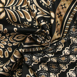 Satin polyester imprimé frise et baroque fond noir