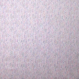 Fina encuadernación de algodón con lentejuelas de manos rosas y azules sobre fondo blanco.