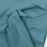 Double gaze irisée bleu fond bleu pétrole