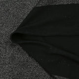 Jersey de polyester irisé argenté fond noir