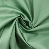Popeline de coton satinée vert amande