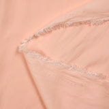 Alba poliéster fluido satinado rosa melocotón