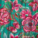 Mousseline imprimée bande satin carnaval de fleurs fond vert