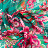 Mousseline imprimée bande satin carnaval de fleurs fond vert