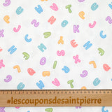 Piqué de coton imprimé alphabet