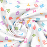 Piqué de coton imprimé alphabet