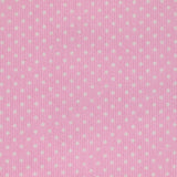 Cotton stung printed with polka dot pink background