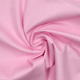 Cotton stung printed with polka dot pink background
